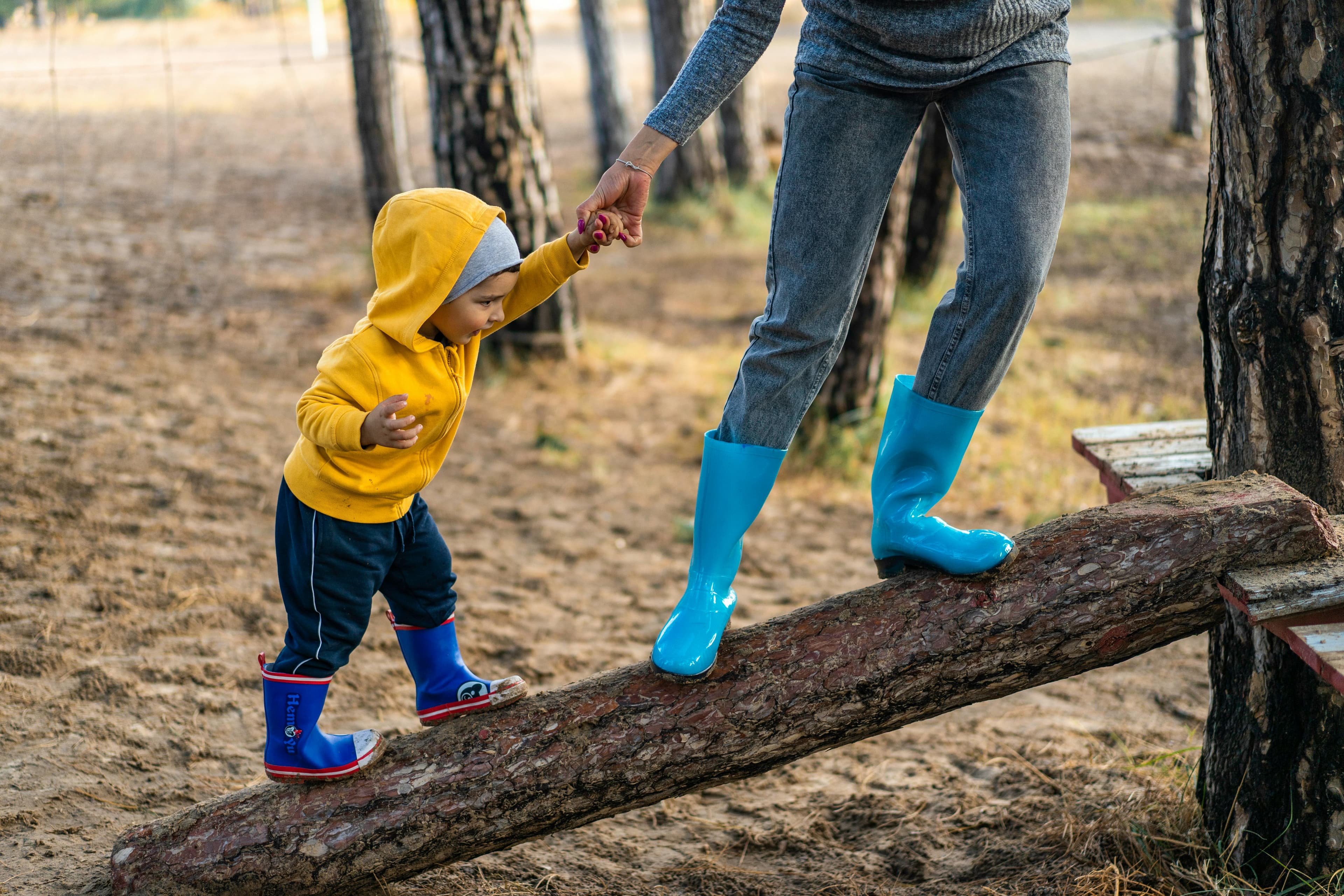 An adult and a child walking together